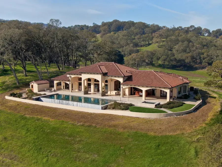 FAA-certified aerial drone photography of luxury estate with pool — Sparks Media Group Northern California